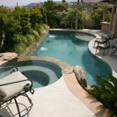 Transitional Pool Area With Beige Pergola