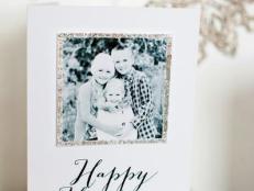 Forget storebought holiday greetings. Show friends and family that you really care with a handmade card featuring a favorite photo within a glitzy glittered frame &#8212; our free printable template makes it a snap.