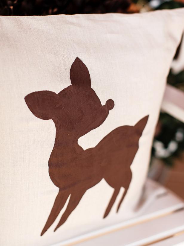 Once paint has dried, display your finished pillow indoors or outdoors in a covered location.