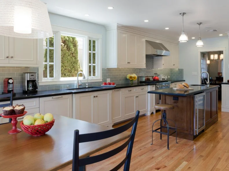 White Transitional Kitchen With Blue-Tile Backsplash White Kitchen With Long Counter, Blue-Tile Backsplash and Island