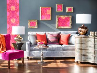 Gray Living Room With Pink Chair, Gray Sofa and Bronze Lamp