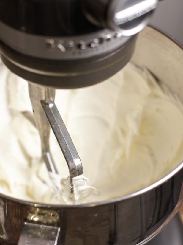 1. Place butter and shortening in a bowl and beat on low speed until smooth and creamy.2. Add confectioners' sugar, 1/2 cup at a time, and mix until fully blended.3. Turn mixer to medium-high and beat for another 3 minutes.