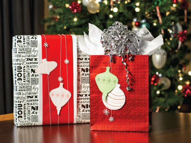 Add some modern flair to your holiday packages with this handmade wrapping embellishment. Jewelry findings and cardstock make for a fun and unique addition.