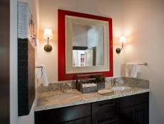 Neutral Double-Sink Bathroom Vanity With Red Mirror