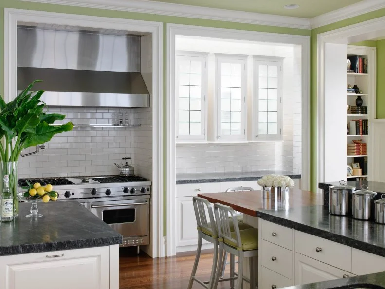 Family-Friendly Kitchen With White Cabinets and Granite Countertops Family-Friendly Kitchen With White Cabinets and Granite Countertops