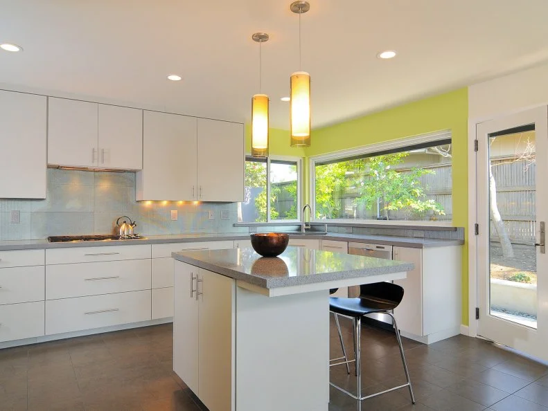 White Contemporary Kitchen With Yellow Accent Wall White Kitchen With Yellow Accent Wall and Granite Countertops