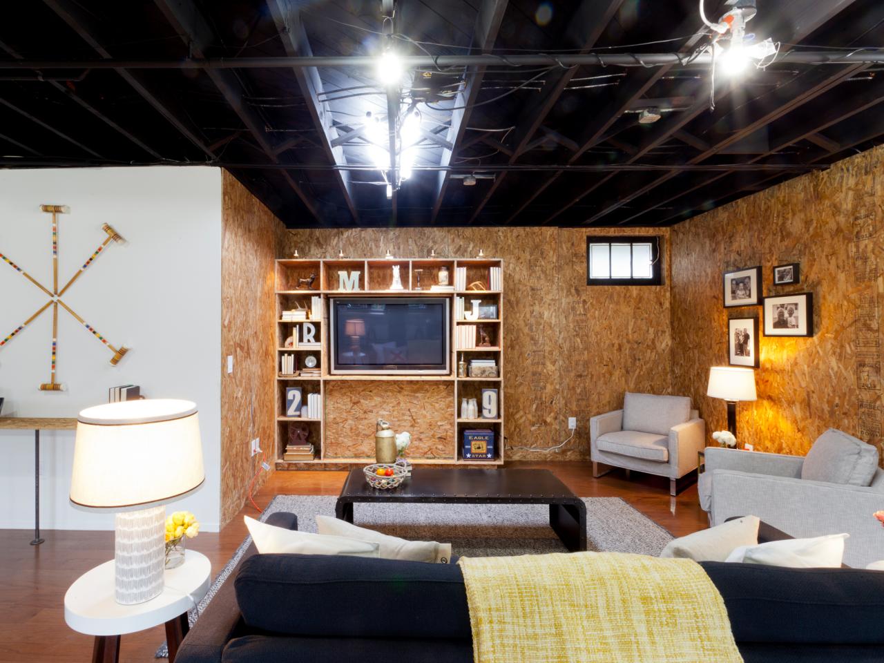 Industrial Living Room With Exposed Ceiling And Unfinished