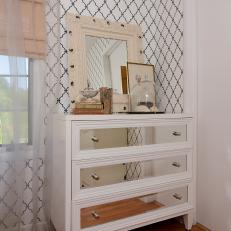 Trellis Wallpaper and Mirrored Dresser in Cottage-Style Bedroom