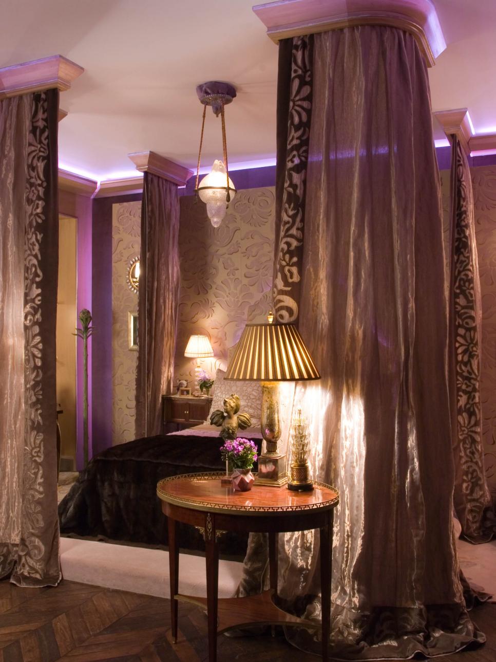 Traditional Bedroom With Canopy Bed and Purple Hues