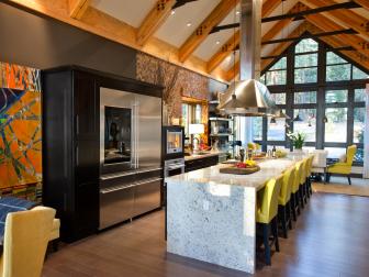 Kitchen With Yellow Stools, Vaulted Ceiling & Stainless Steel Hood
