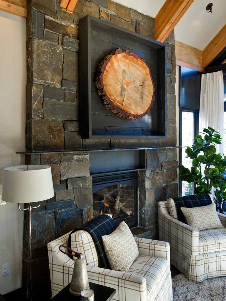 Rustic Living Room With Wooden Beams and Stone Fireplace 
