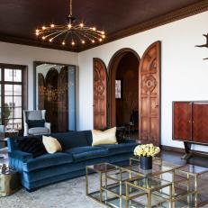 Living Room With a Velvet Sofa and Copper Tin Ceiling