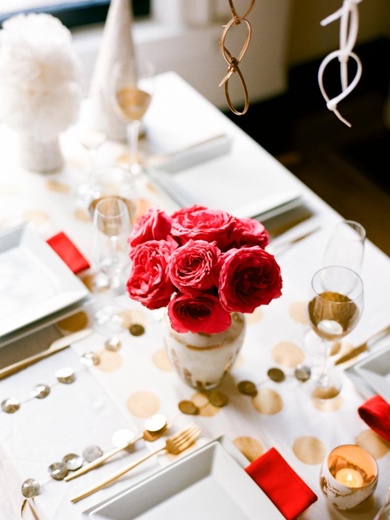 Rose Bouquet on Table With White and Gold Decor