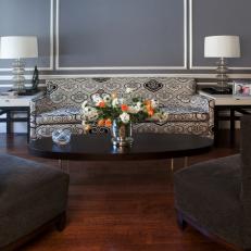 Elegant Blue Living Room With Patterned Sofa