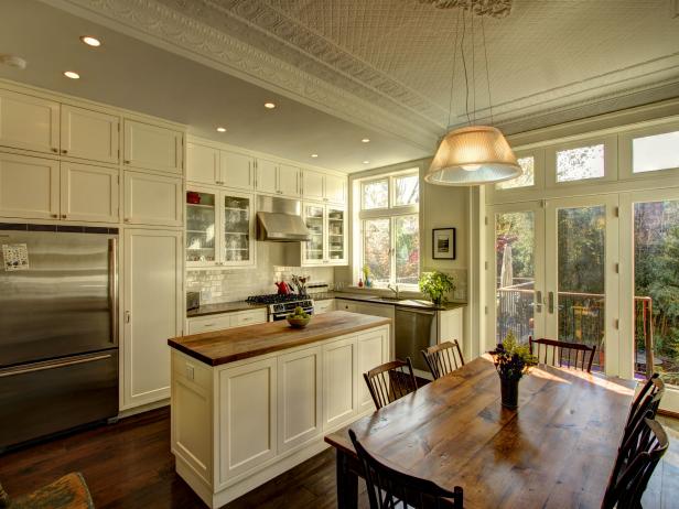White Country Kitchen with Cabinets and Tin Ceiling