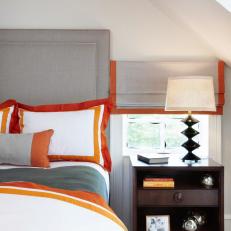 Neutral Kid's Bedroom Gets Orange Pop of Color