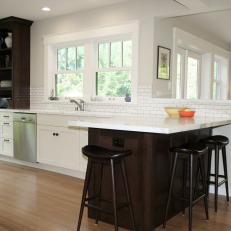 Bright White Kitchen With Wood Peninsula