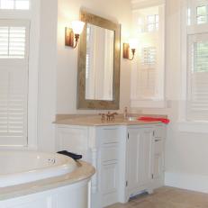 White Cabinets Look Classic In Traditional Bathroom