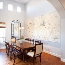 Arched Entryway Leads Way to Elegant Dining