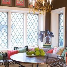 Bohemian Breakfast Nook with Chandelier and Graphic Throw Pillows
