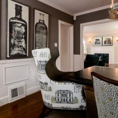 Gray Transitional Dining Room With Patterned Chairs and Artwork 