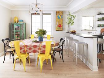 Eclectic breakfast nook with yellow and blue accents.
