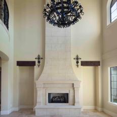 Mediterranean Living Room With Travertine Fireplace