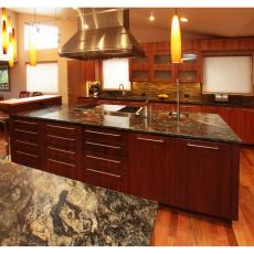 Contemporary Kitchen With Industrial Hood Vent