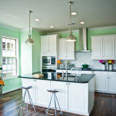Pale Green Contemporary Kitchen With Large Island