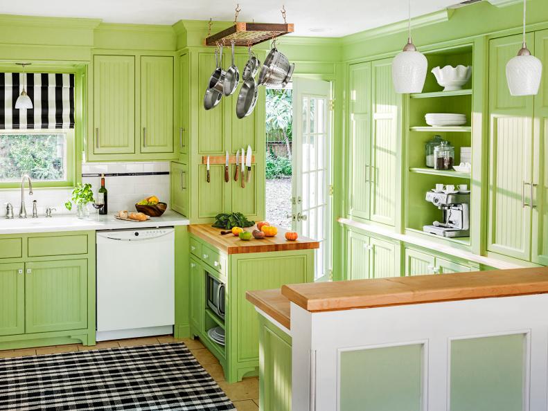 Green and White Traditional Kitchen With Custom Cabinetry