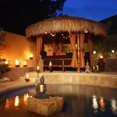 Asian-Themed Swimming Pool With Tiki-Style Cabana