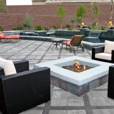 Modern Patio With Stone Firepit and Tiled Water Feature