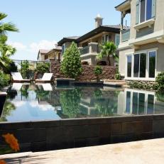 Infinity Pool in Mediterranean-Inspired Backyard