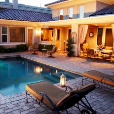 Mediterranean Stone Patio With Luxurious Swimming Pool and Outdoor Room