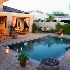 Mediterranean-Style Pool With Stone Patio