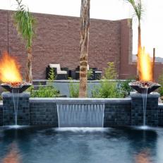 Tropical Pool With Waterfall and Fire Feature