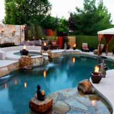 Swimming Pool With Hot Tub and Flagstone Walls