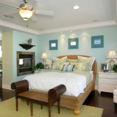 Blue Coastal Bedroom With Two-Way Fireplace