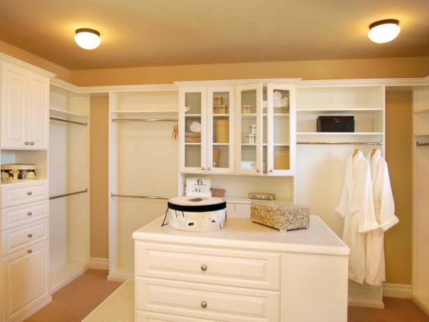 Traditional Walk In Closet With Island Dresser Hgtv