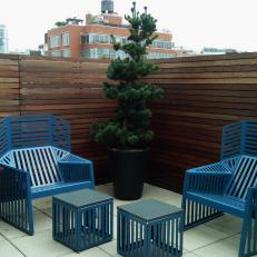Urban Rooftop Patio With Contemporary Blue Metallic Furniture