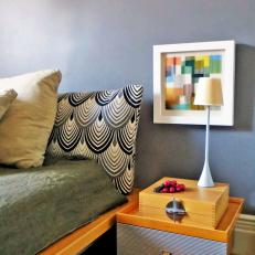 Bedroom with Contemporary Nightstand & Colorful Artwork 