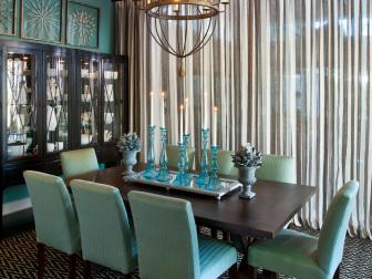 Dining room with transitional furnishings in brown and blue. 