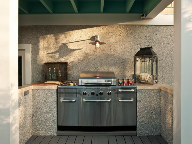 Neutral Stone Grilling Space With Stainless Steel Grill, Light Fixture