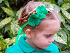 Use craft felt in various shades of green and a needle and thread to create shamrock embellishments. Attach them to ribbon, safety pins, hair clips and more for a festive St. Patrick's Day look.
