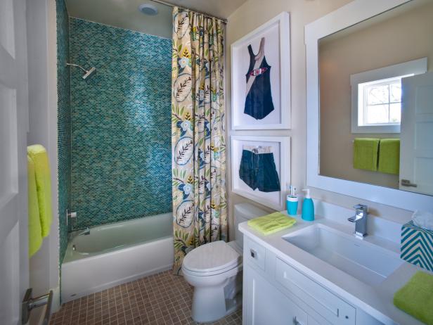 Blue Glass Tile Shower In A Charming Kids Bathroom