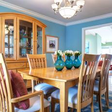 Blue Dining Room With Traditional-Style Furniture