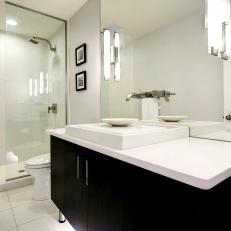 Wall-Mounted Faucet in Black & White Bathroom