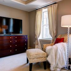 Neutral Transitional Bedroom Sitting Area With Flat-Panel TV