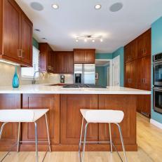 Teal Transitional Kitchen With Modern Barstools
