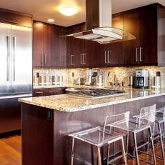Contemporary Kitchen With Granite Countertop and Backsplash
